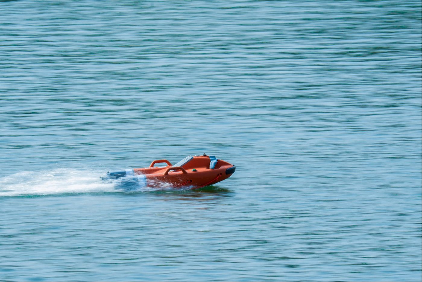 The Dolphin 3 running at speed across open water